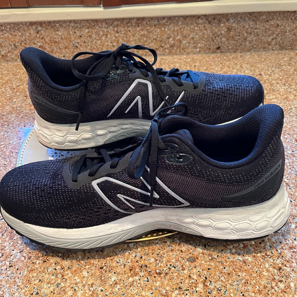 New Balance Black and White Athletic Shoes with Cushioned Midsole